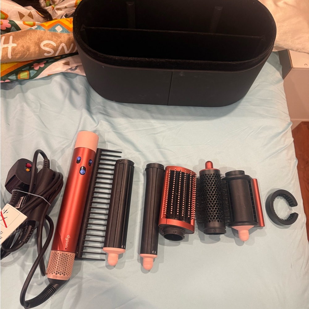 Dyson Red Hair Styling Tool for Effortless Elegance - Picture 3 of 4